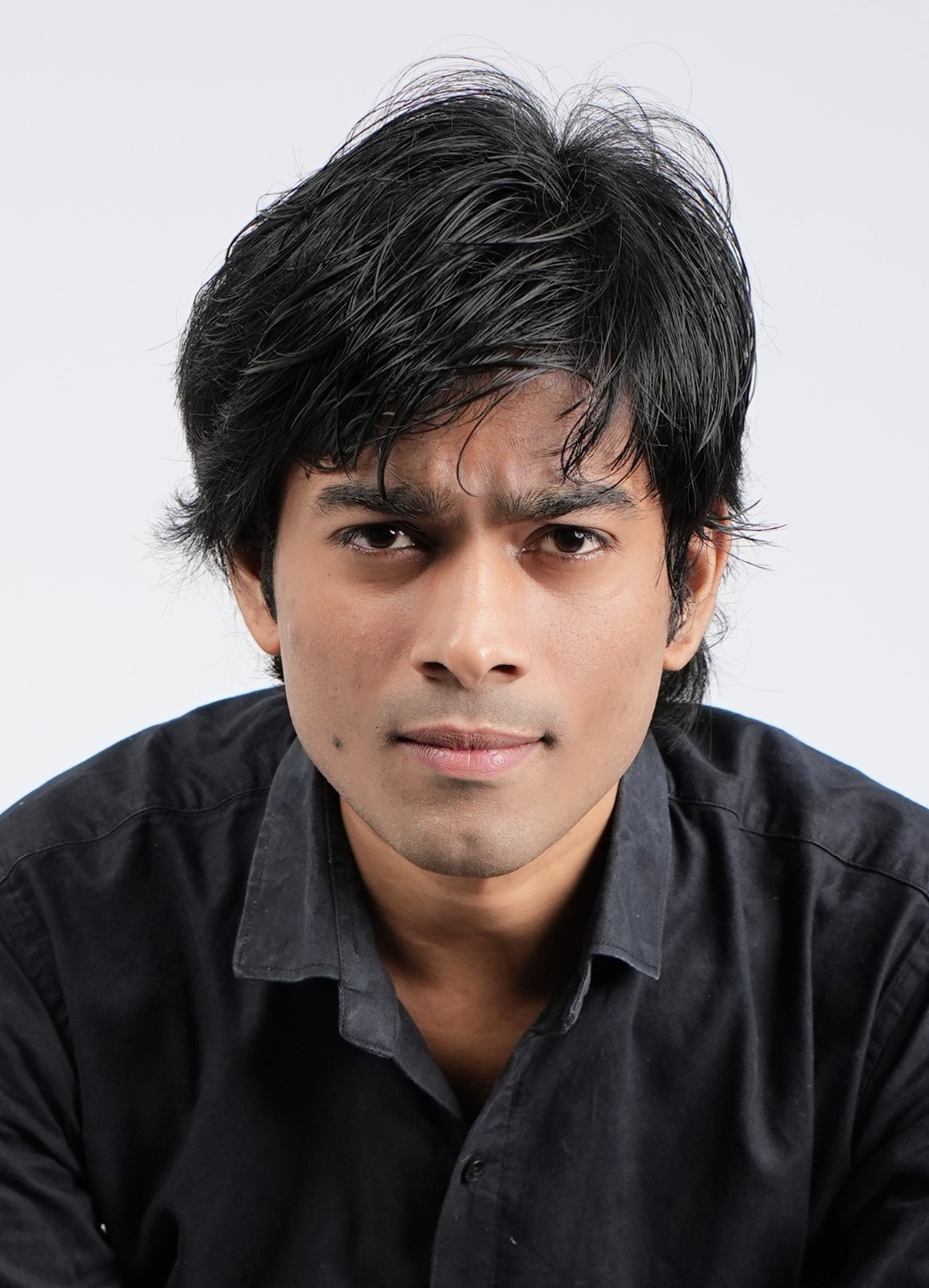 Shiv Saurabh Shukla, close up studio portrait