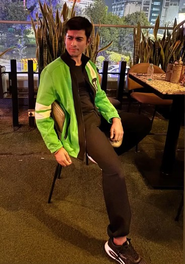 Green jacket casual look