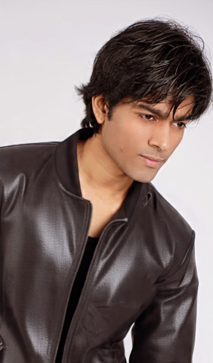 Shiv Saurabh Shukla, stylized leather jacket portrait