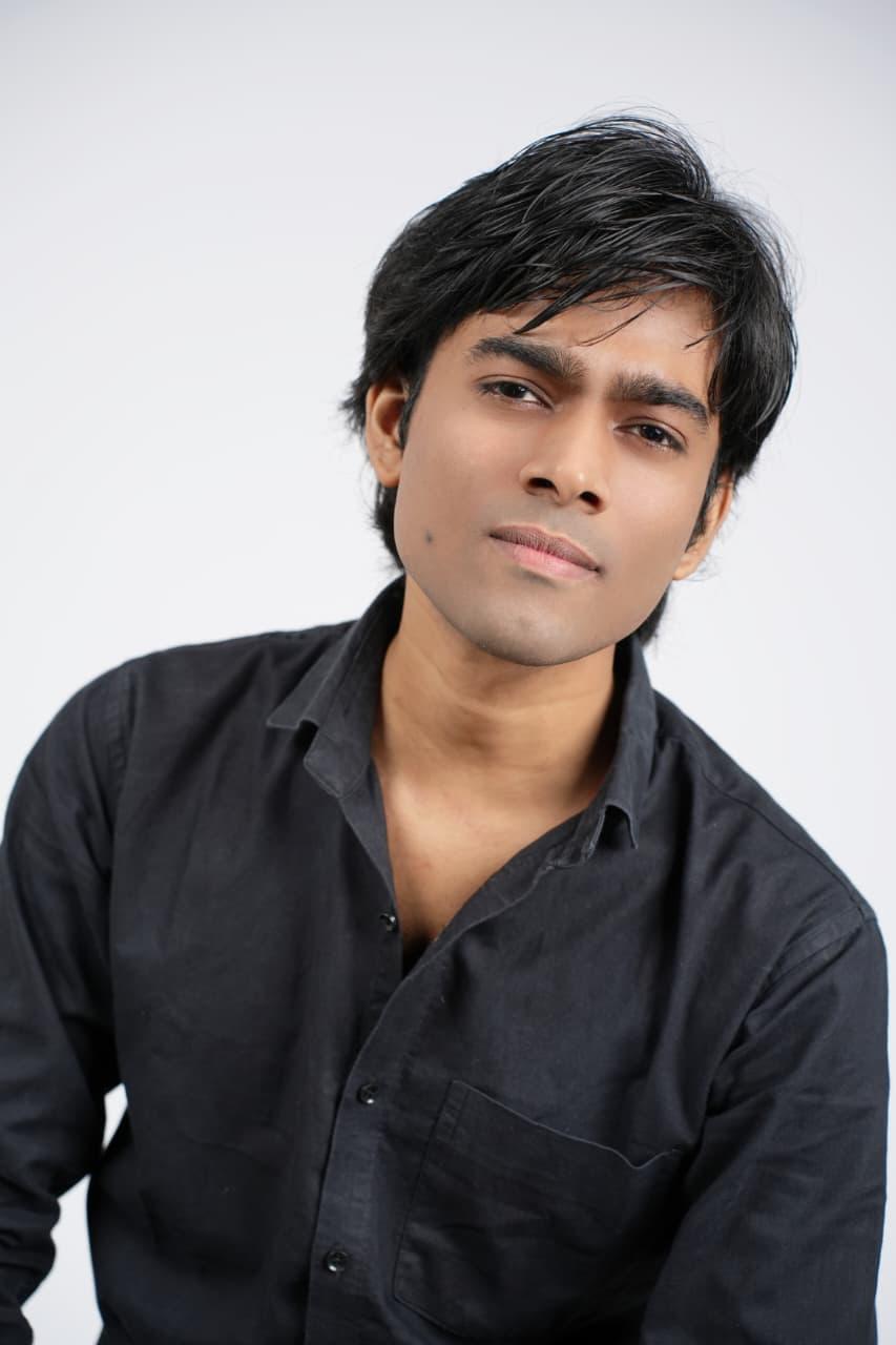 Intense close up portrait in a dark shirt